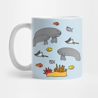 Manatee with colorful fish Mug